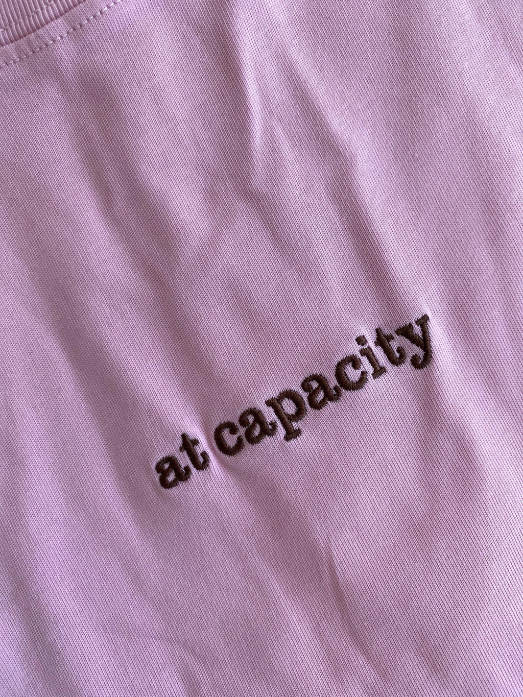 "at capacity" Oversized Tee
